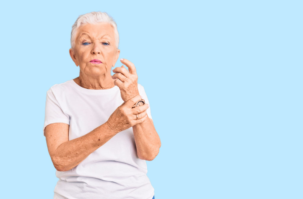 Senior woman with arthritis in her left wrist.